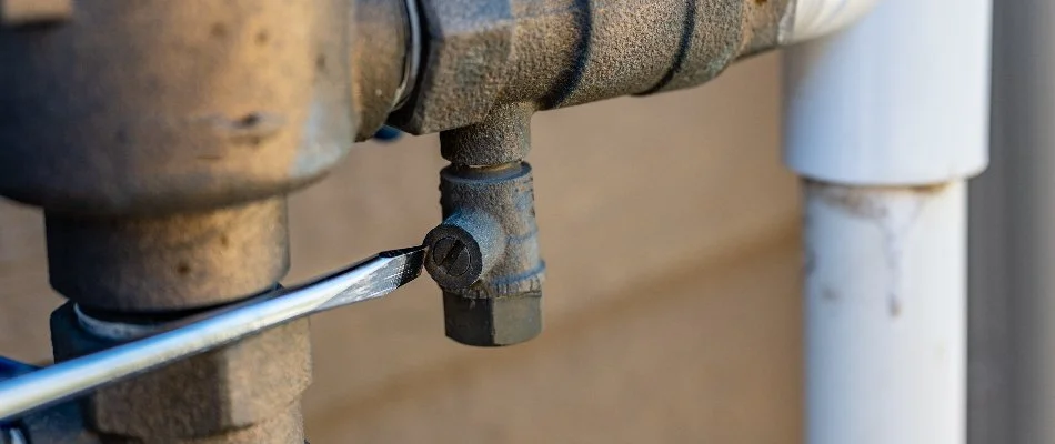 Irrigation system in Cary, NC, having valves adjusted.