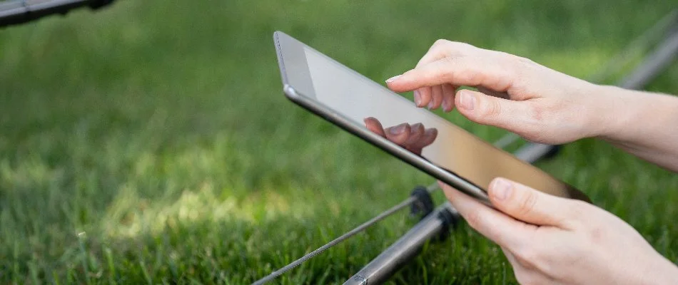 Smart irrigation system in Cary, NC, being controlled from a smartphone.