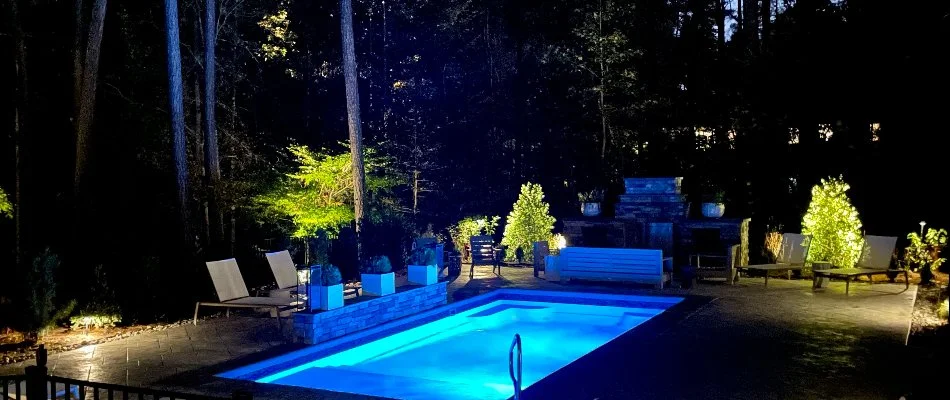 Pool in Cary, NC, illuminated at night.